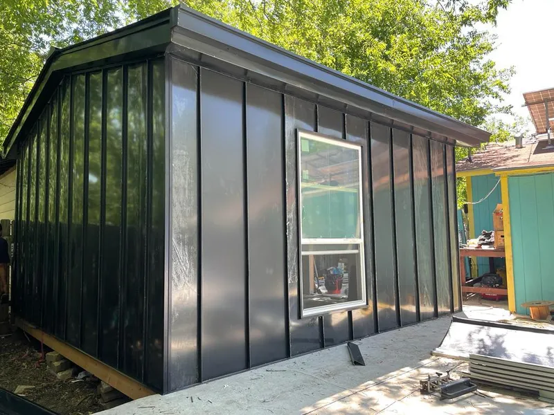 Black standing seam metal wall panels for Roof Inspection in Hatfield